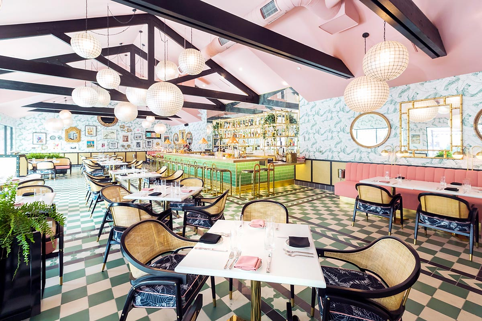 The Pink Cabana: Mediterranean-inspired decor with vibrant dishes.