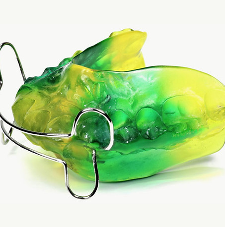 Grüne Zahnspange zur Funktionskieferorthopädie für den gesamten Kiefer als lose Zahnpange