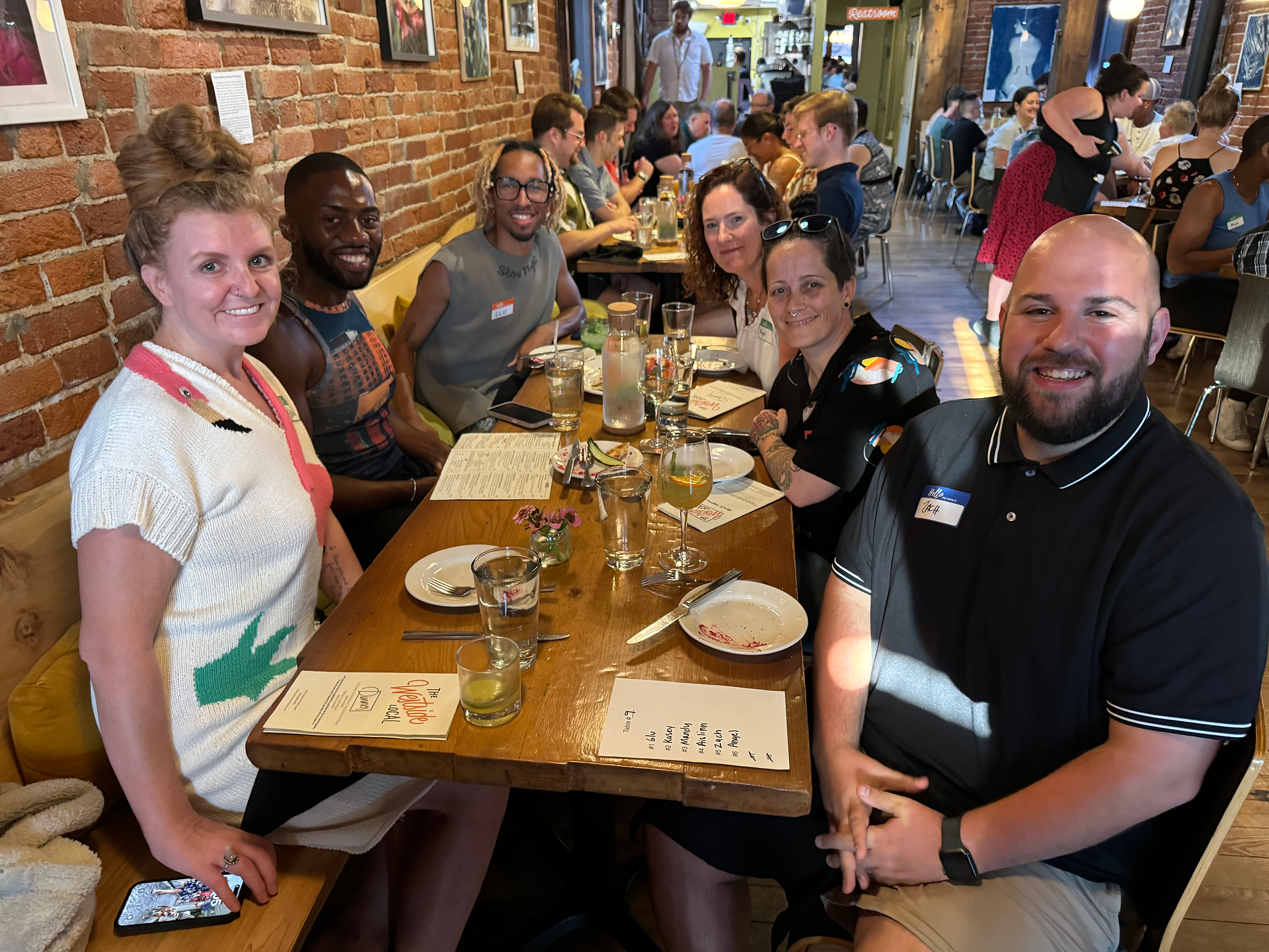 six people sharing a meal 