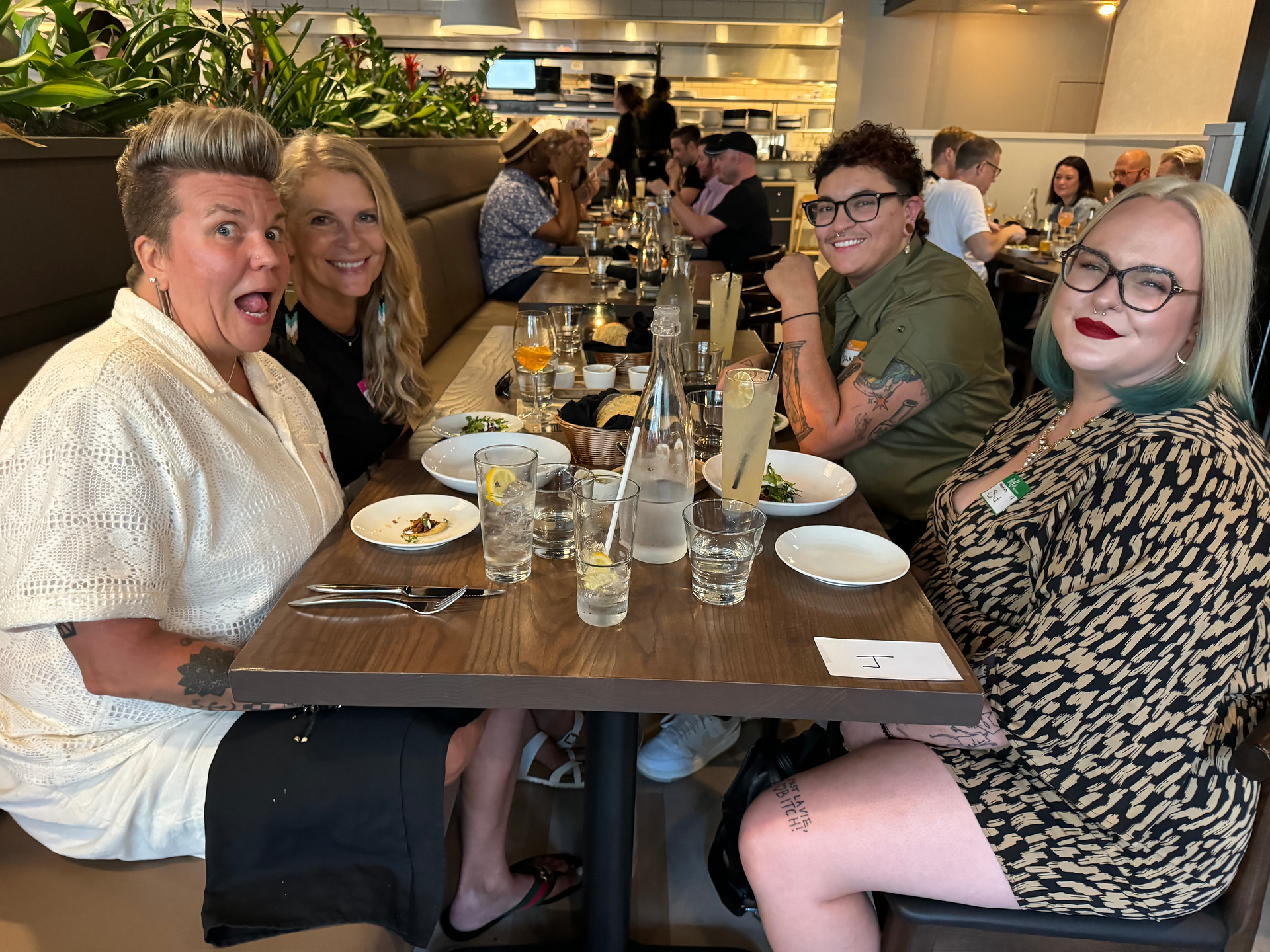 Four Women connecting at Queer Dinner Club