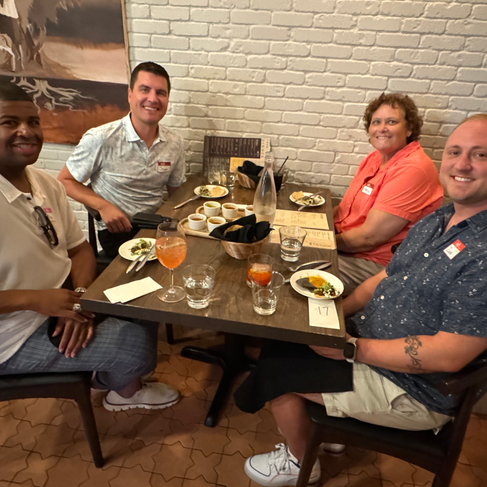 People connecting at Queer Dinner Club