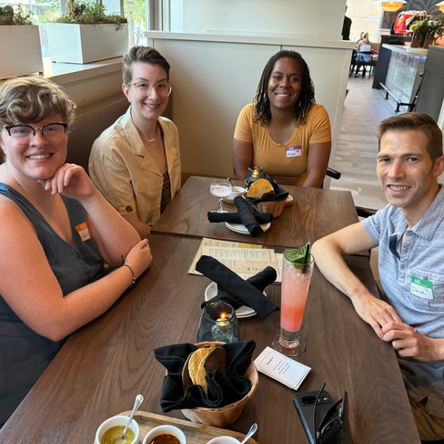 People connecting at Queer Dinner Club