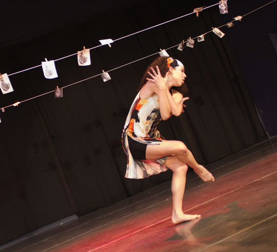 Image, dancer standing on one leg with arms and other leg crossed