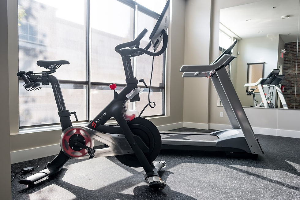 Peloton bike and treadmill at Mary Elisa Fitness in Surrey.