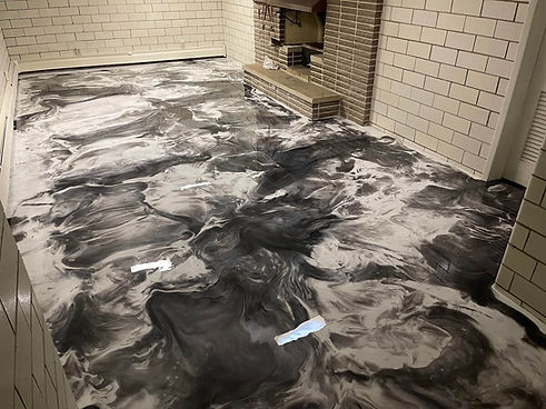 metallic-epoxy-floor-black-white-marble.jpeg