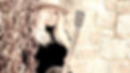 jaime in hat cover of website.jpeg