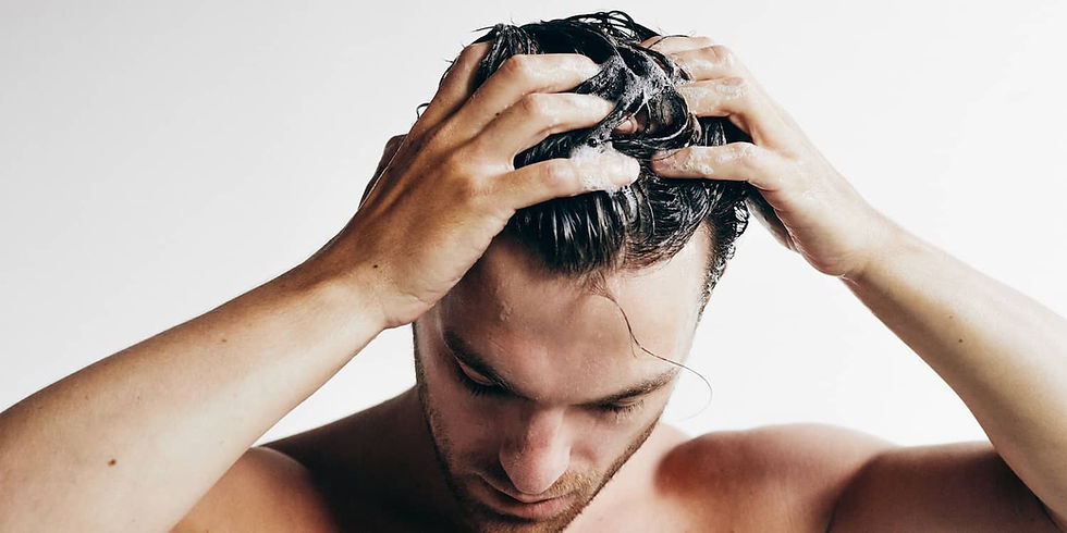 Man washing hair.