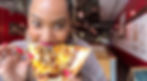 Tamika eating vegan pizza.