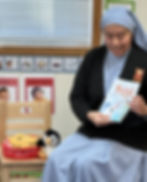 Sr. Gianna Reading to Children at Headstart.