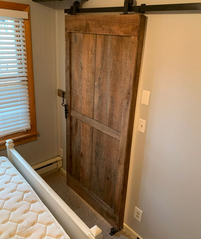 Traditional entry barn door