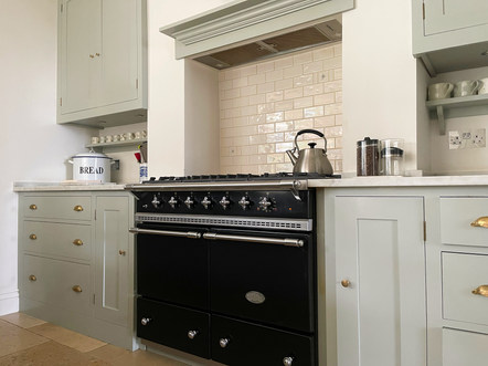 the simple, elegant proportions of the Shaker kitchen make it the perfect choice for a London cottage