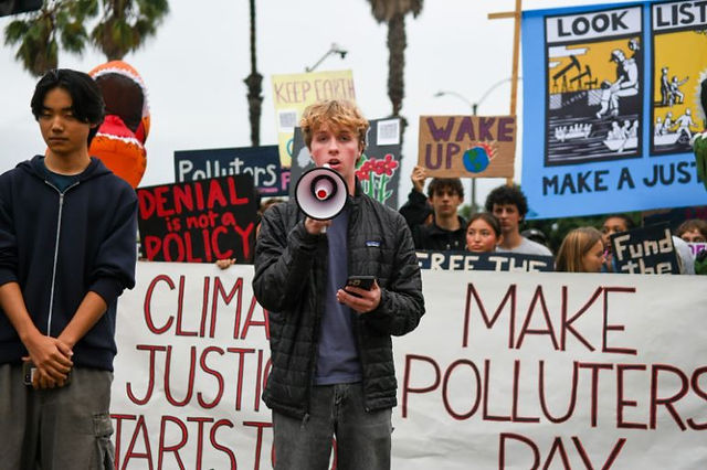 More activists giving a speech.