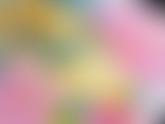 Close-up watercolor painting of a yellow-and-blue reef fish surrounded by bright pink hibiscus flowers and green leaves on a soft blue background, painted on textured deckle-edge paper