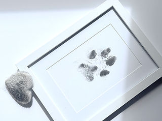 dog paw ink print art and felted fur heart made of the dog's fur as a grief keepsake