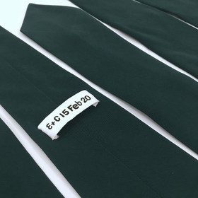 Bespoke handmade wedding ties in bottle green.