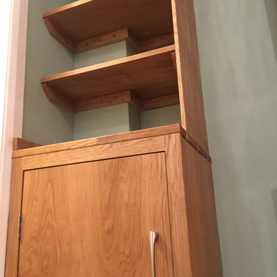 Solid oak cabinet built to match a pre-existing unit.