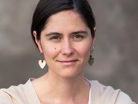 Claire Applemen's headshot. She is a sex education educator.