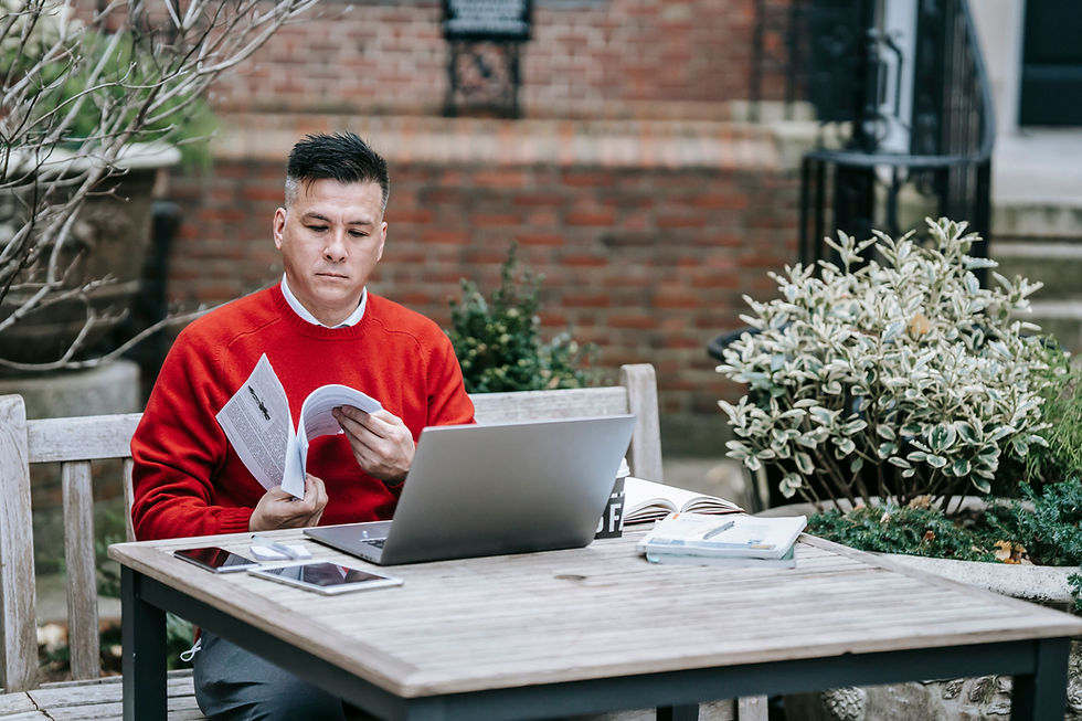 Small business owner reviewing paperwork while purchasing equipment eligible for the Section 179 deduction