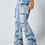 Thumbnail: Street Life Men's Splatter Print Layered Flared Cargo Jeans