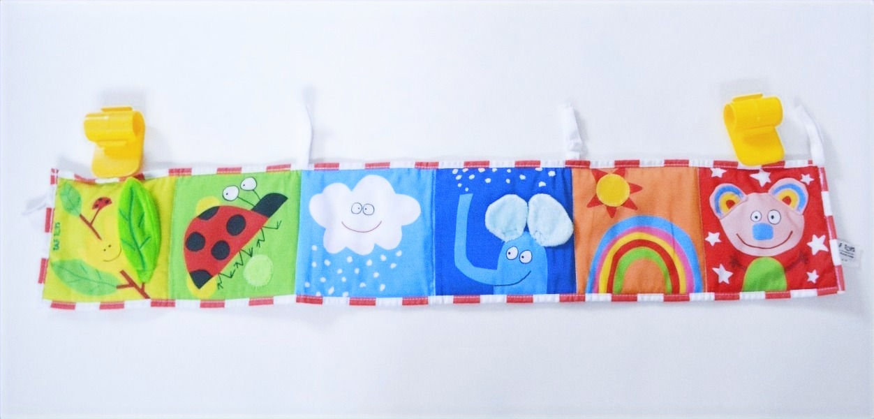 Soft picture book.Different colours, patterns, textures, sound.