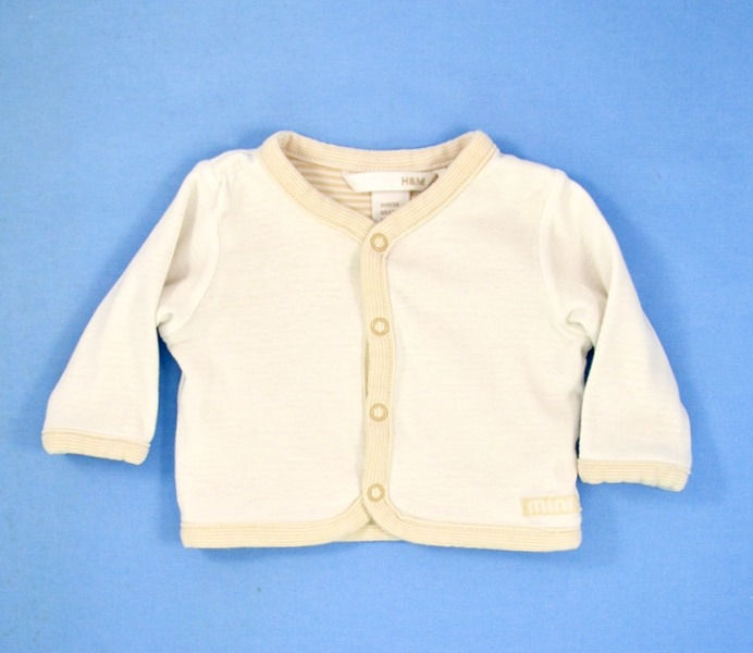 Jacket. White. V neck.