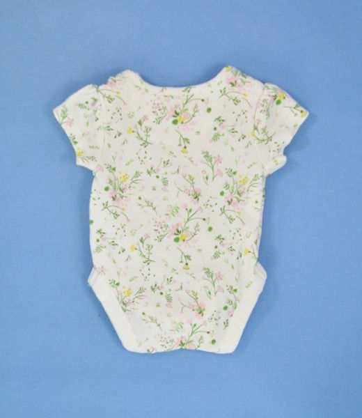 Thumbnail: Bodysuit has envelope neck. Floral design all over.