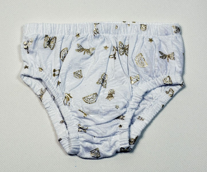 Briefs in white with gold design usuing music, butterflies all over.