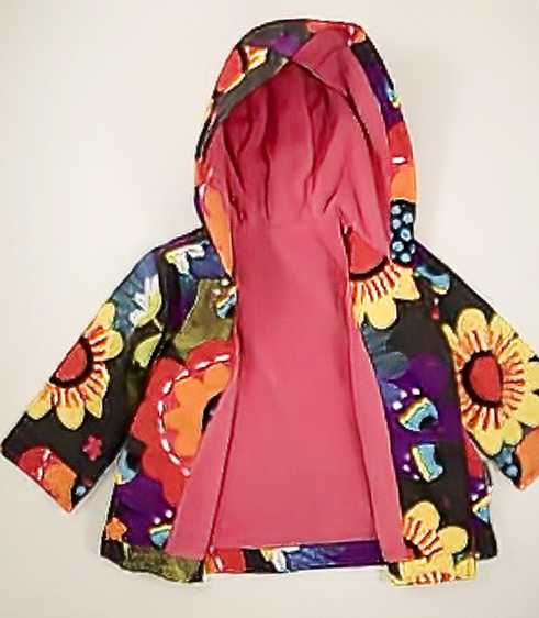 Thumbnail: Coat has a silk type pink lining. four button fastening.