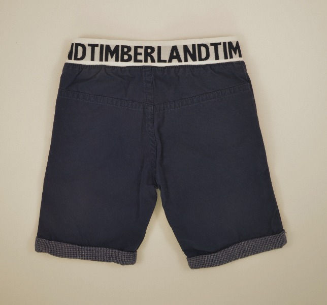 Thumbnail: 2 side pockets.Turn ups in small dogs-tooth check material.