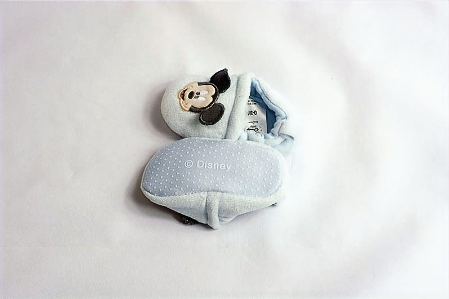 Thumbnail: Mickey Mouse decoration on front.