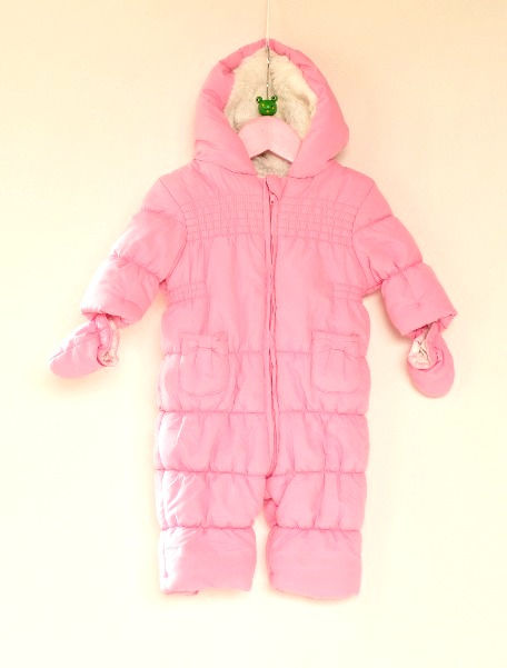 Pramsuit.Pink.Long sleeves.Mittens attached with buttons inside.Integrated hood.Zip with storm flap behind.2 patch pockets.