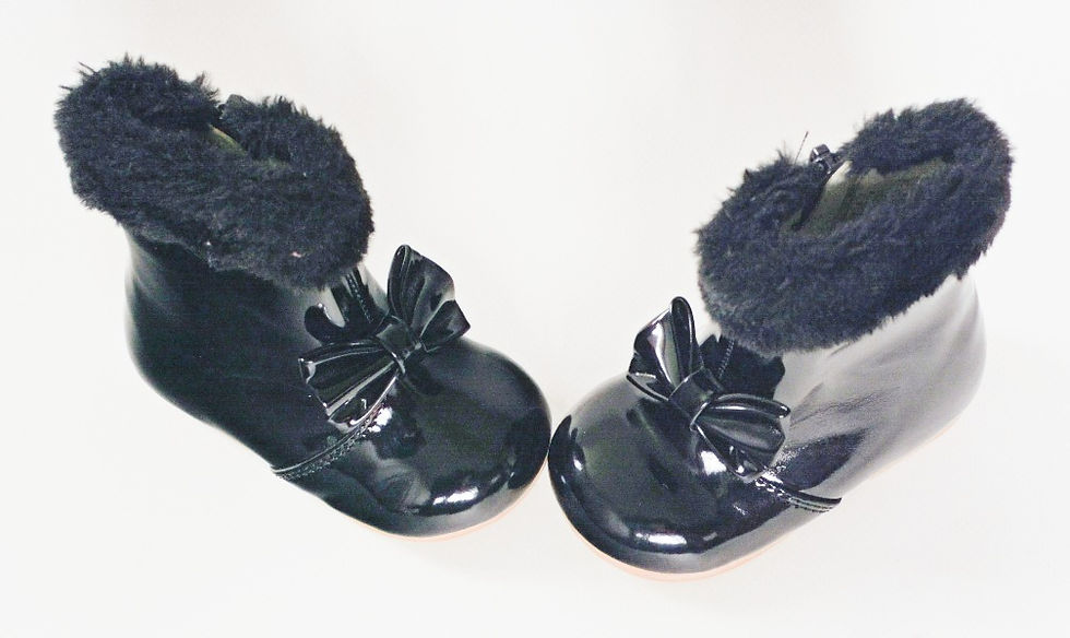 Thumbnail: Patent look with faux fur trim aroind top of leg.