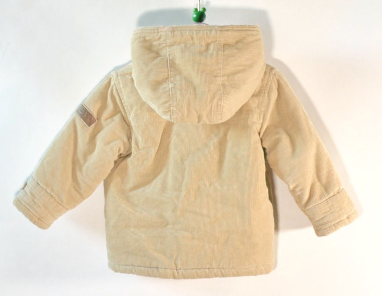 Thumbnail: 4 toggle fastening on top.2 patch pockets. Corduroy material.Body and hood lined in faux fur.