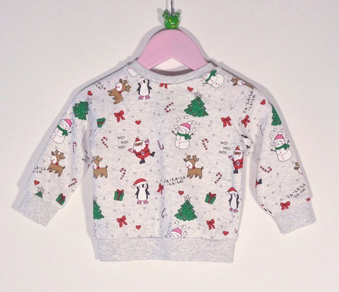 Christmas sweatshirt.Pale grey multi.Long sleeves.Ribbed cuffs.Round neck with ribbed edging and 2stud fastener.Ribbed hem.