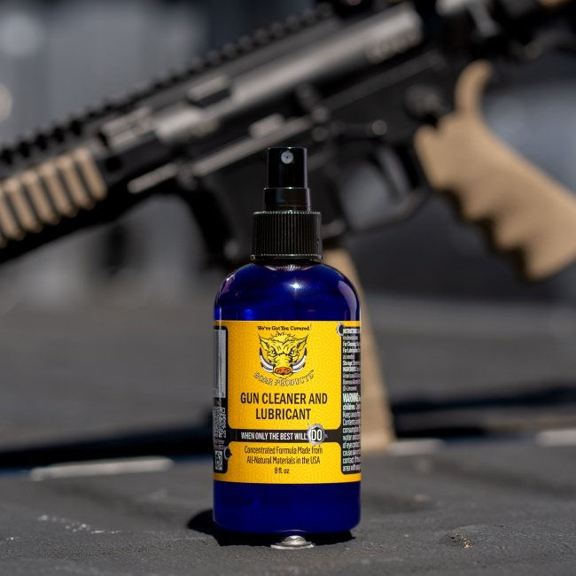 Thumbnail: Boar Products Gun Cleaner and Lubricant in front of an AR15