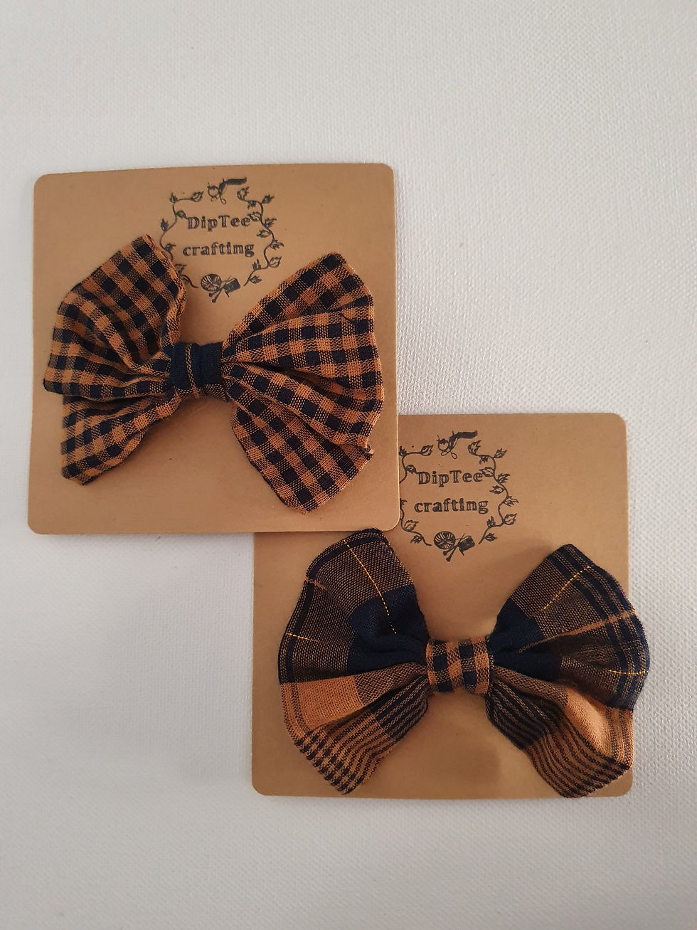 Thumbnail: Classic brown gingham bow with contrasting navy center wrap