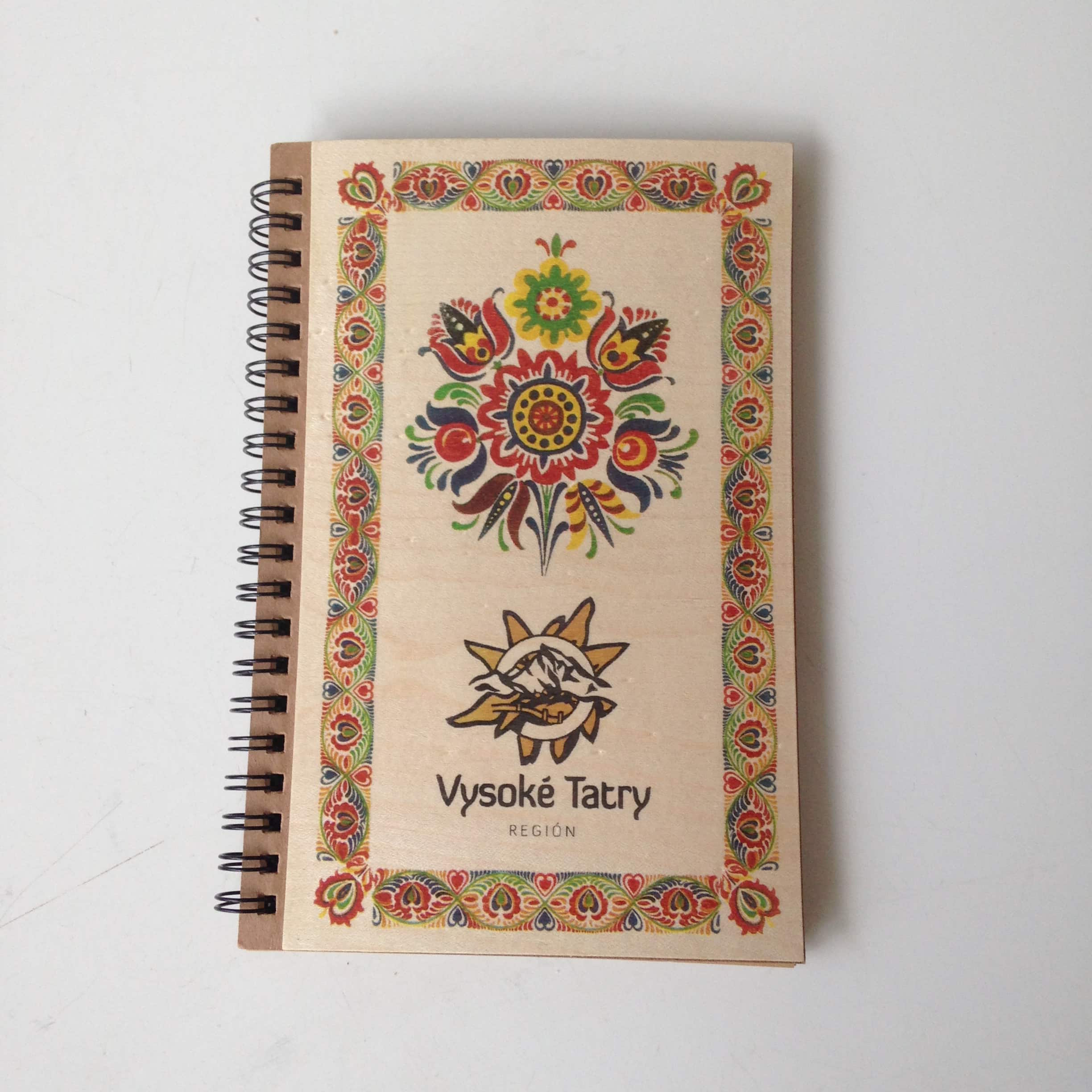 Veneer fronted notebook