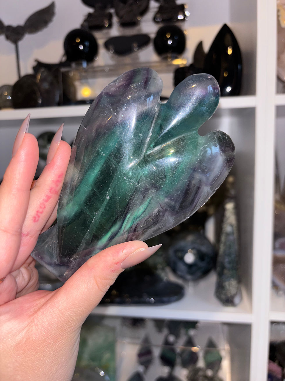Thumbnail: Fluorite angel carving 