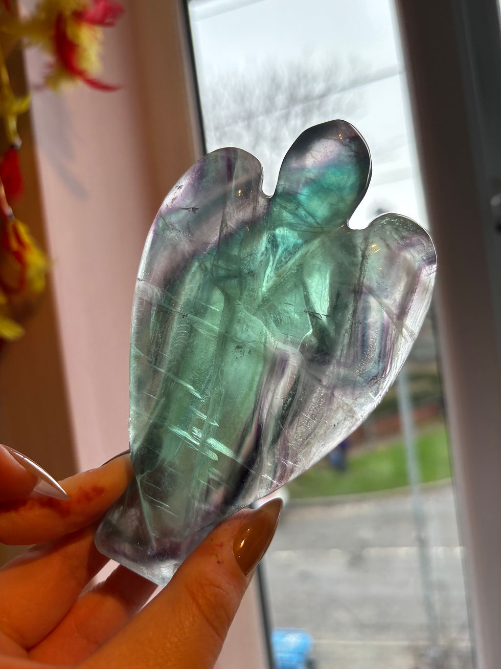 Thumbnail: Fluorite angel carving 