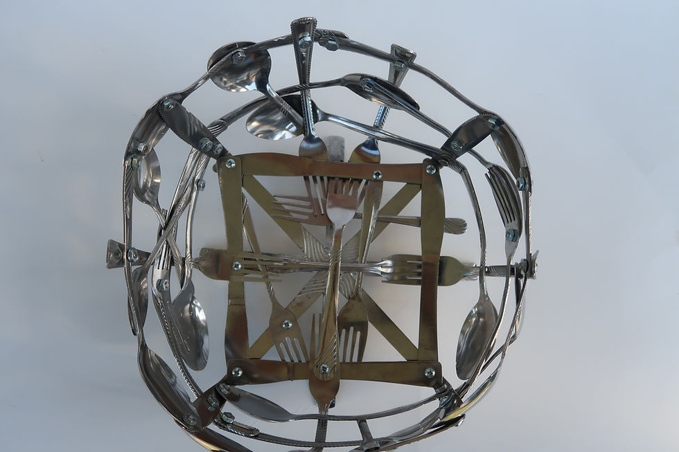 Thumbnail: Custom Made fruit bowl made from kitchen utensils top angle.