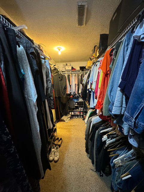 Closet before renovation showing original layout and limited storage in Dallas home