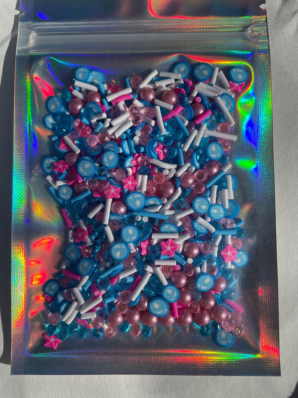 Thumbnail: Under the sea polymer clay mix - pink starfish and pink and blue sprinkles