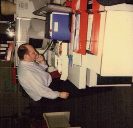 Jason in the office making executive decisions on which cake to have