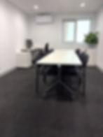 Our meeting room with large table and chairs