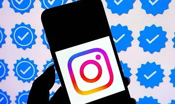 640x410_in-this-photo-illustration-an-instagram-logo-is-displayed-on-a-smartphone-with-a-b