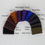 Thumbnail: Leather covered needle cases with four white felt pages for pins, needles etc.  Current varieties in a fan