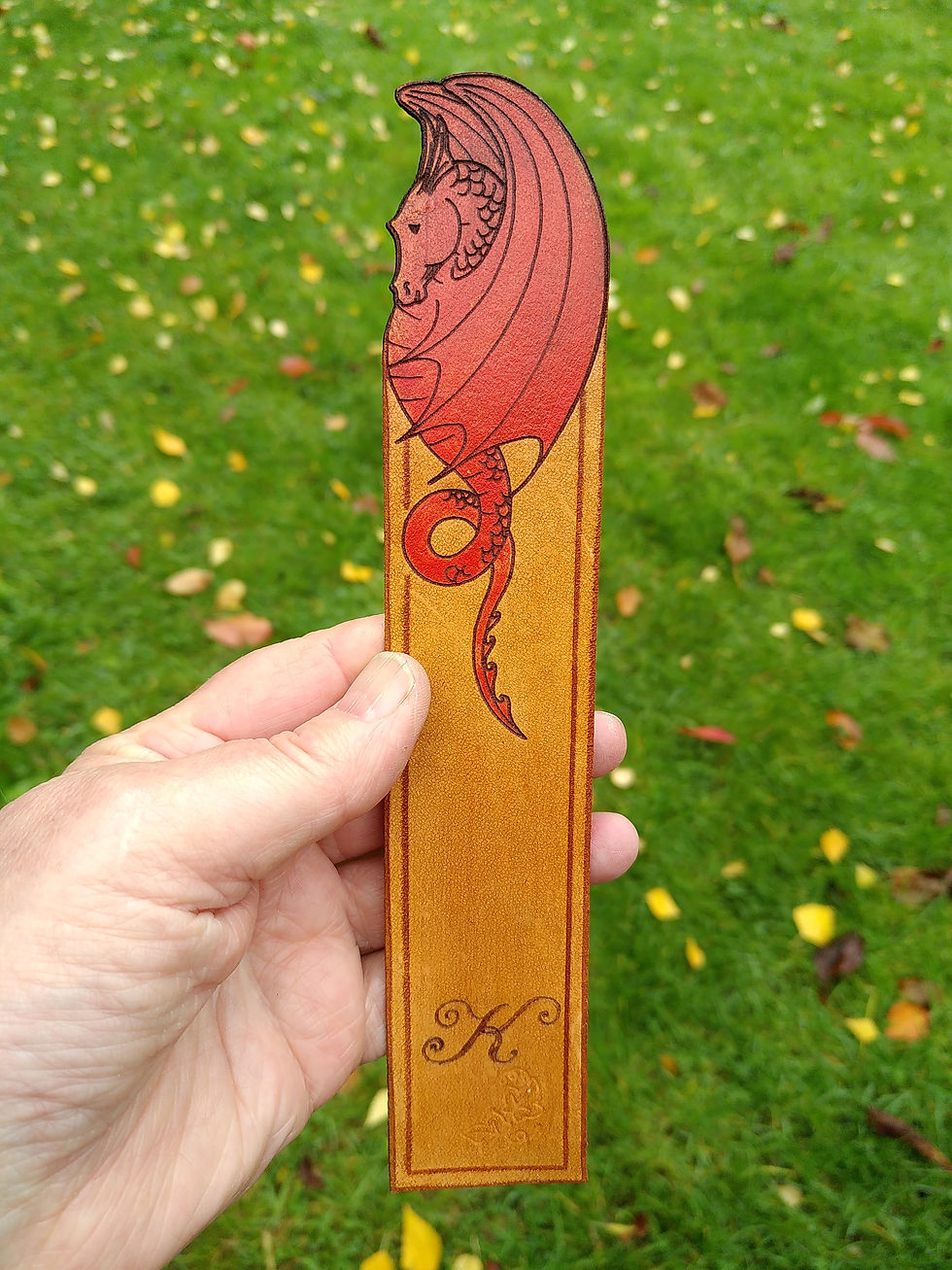 Thumbnail: Red tinted  leather dragon/wyvern bookmark
