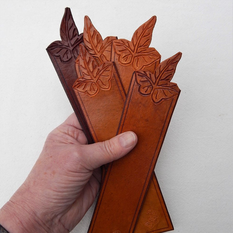 Thumbnail: Self coloured cut out leaf leather bookmarks, various hues
