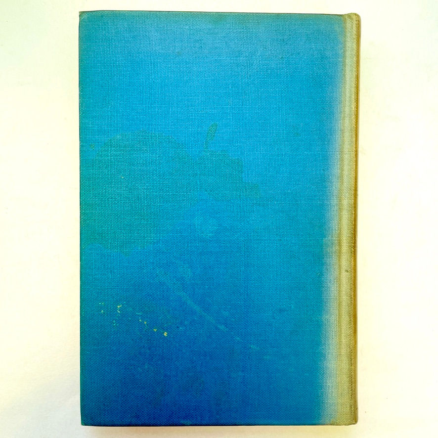 Rear board of 1935 The Odyssey of Homer by T. E. Lawrence, showing original blue cloth with surface marks, stains, and light