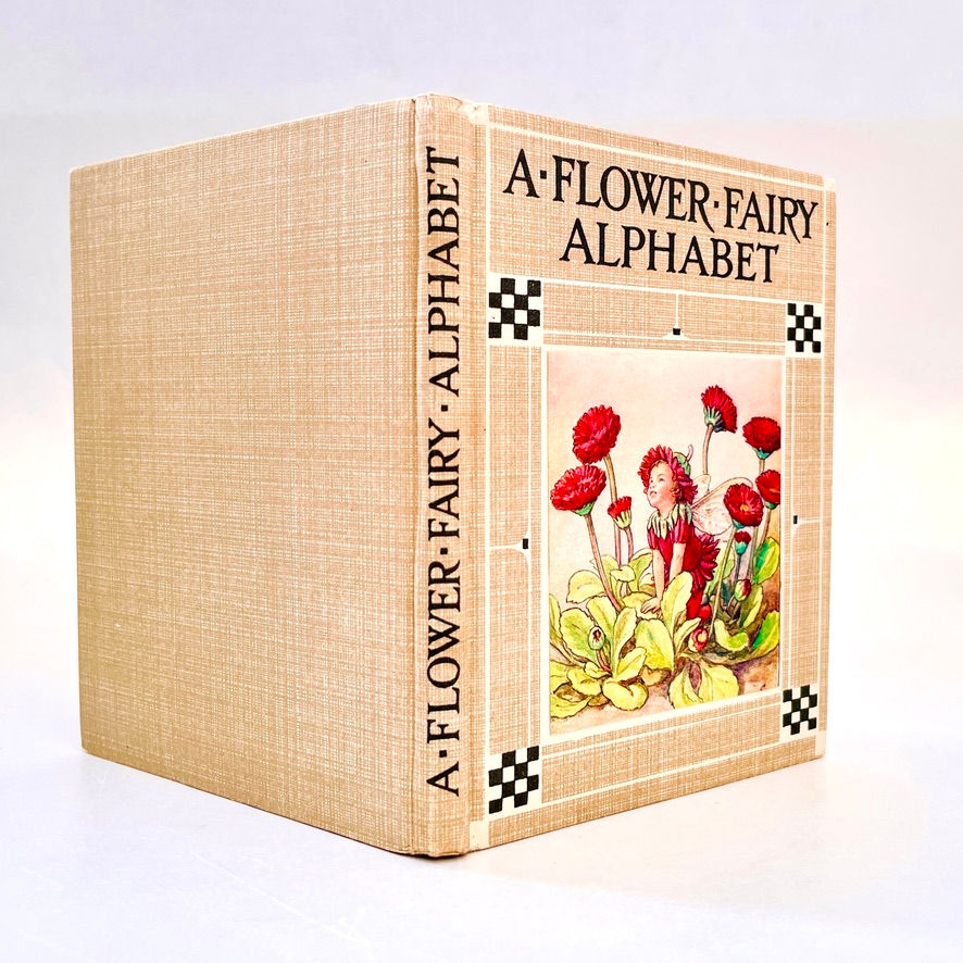 縮圖：Decorated boards and spine of A Flower Fairy Alphabet by Cicely M. Barker, 1950s edition.
